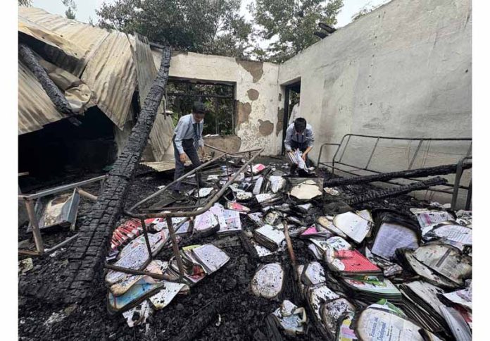 Ruins of a Government school building damaged in fire in Kulgam. — Excelsior/Sajad Dar Ruins of a Government school building damaged in fire in Kulgam. — Excelsior/Sajad Dar