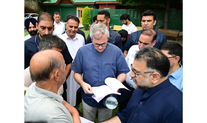 CM interacting with citizens at Raabita office Srinagar on Friday.
