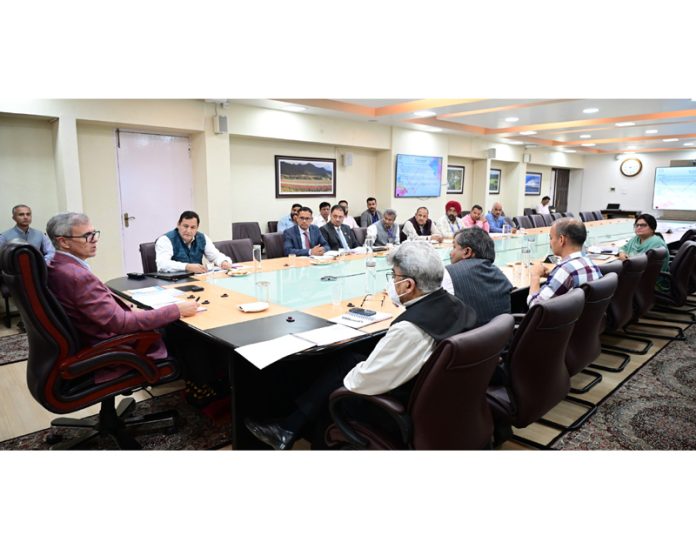 CM Omar Abdullah chairing a meeting at Srinagar on Wednesday.