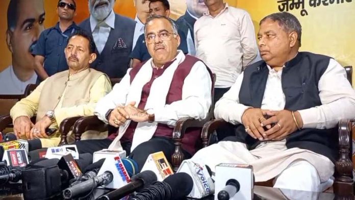 BJP national general secretary, Tarun Chugh, Party JKUT President Sat Sharma and general secretary, Baldev Singh Billawaria at a press conference at Jammu on Thursday. -Excelsior/Rakesh