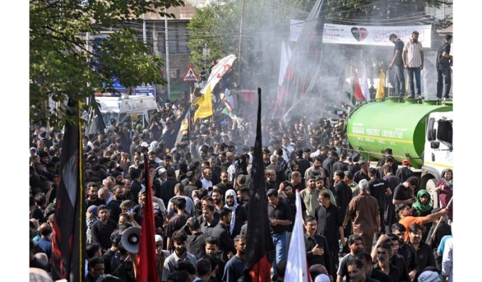 Shia mourners during 7th Muharram procession in the old city of Srinagar on Thursday. -Excelsior/Shakeel Shia mourners during 7th Muharram procession in the old city of Srinagar on Thursday. -Excelsior/Shakeel