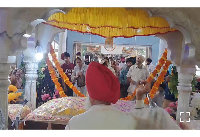 Devotees offering prayers at Gurdwara Talab Tillo in Jammu on Saturday. Devotees offering prayers at Gurdwara Talab Tillo in Jammu on Saturday.