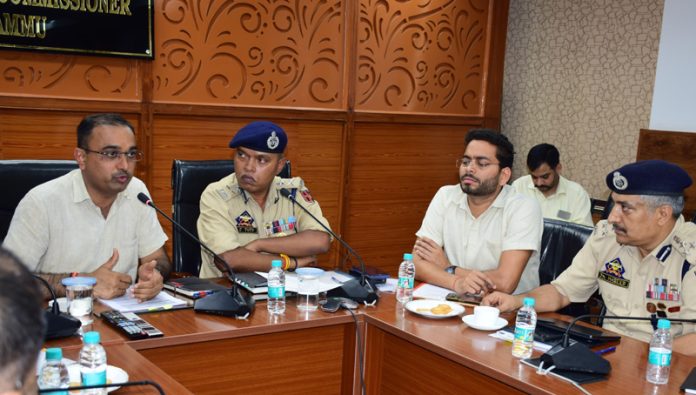 Div Com and IGP chairing a meeting. Div Com and IGP chairing a meeting.