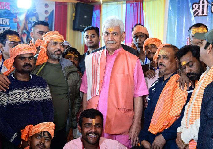 Lieutenant Governor Manoj Sinha meeting pilgrims at Nunwan Base Camp on Tuesday.