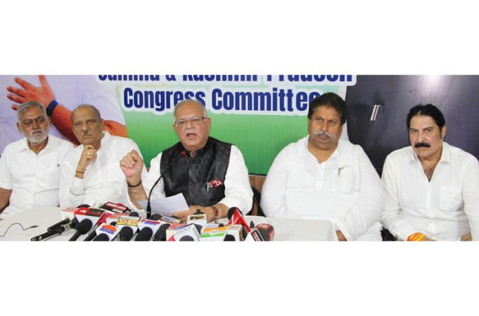 JKPCC chief T H Karra, flanked by others addressing press conference in Jammu. — Excelsior /Rakesh JKPCC chief T H Karra, flanked by others addressing press conference in Jammu. — Excelsior /Rakesh