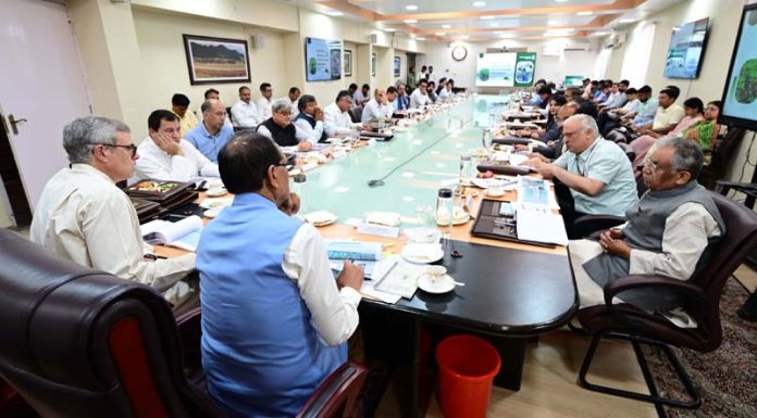 Union Minister Shivraj Chouhan and CM Omar Abdullah jointly chairing a meeting at Srinagar on Thursday.