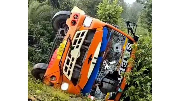 Overturned passenger bus after accident near Ramnagar on Thursday. -Excelsior/K Kumar