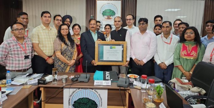 CUJ Vice-Chancellor being presented AACSB pin by Regional Head, South Asia, AACSB International. CUJ Vice-Chancellor being presented AACSB pin by Regional Head, South Asia, AACSB International.