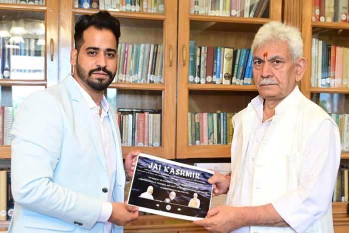 LG Manoj Sinha releasing a patriotic song along with its composer Dr Mohd Shuaib Zahoor at Raj Bhawan, Srinagar. LG Manoj Sinha releasing a patriotic song along with its composer Dr Mohd Shuaib Zahoor at Raj Bhawan, Srinagar.