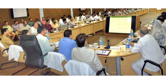 MP Jugal Kishore Sharma chairing DISHA meeting at Reasi on Friday.