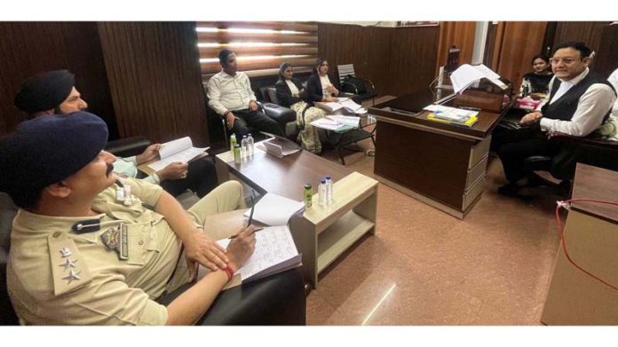 Chairman DLSA, Ravinder Nath Wattal chairing Undertrial Review Committee meeting at Samba on Friday.