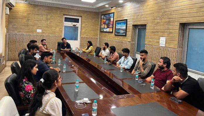 JD Tourism, Aijaz Qaiser, interacting with social media influencers in Jammu.