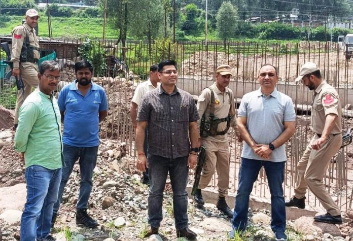 DC Poonch inspecting a developmental work on Monday.