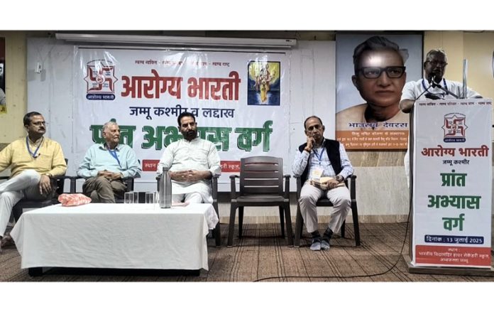 A speaker addressing during a workshop organized by Arogya Bharti in Jammu.