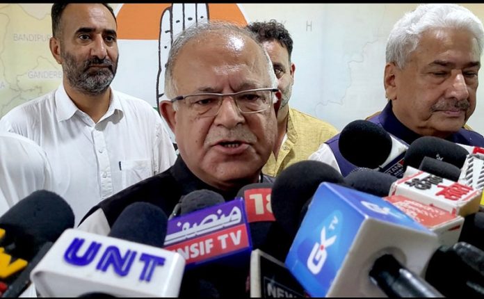 JKPCC president Tariq Hameed Karra speaking to reporters in Srinagar on Thursday. -Excelsior/Shakeel