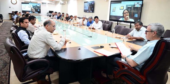 CM Omar Abdullah meeting with delegation of Dal dwellers at Srinagar on Tuesday.
