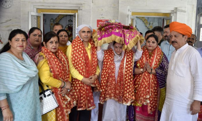 MLA Shagun Parihar along with other dignitaries taking out 'Chhari Mubarak' of Mata Sarthal Devi from Gori Shankar Temple, Sarkoot in Kishtwar.