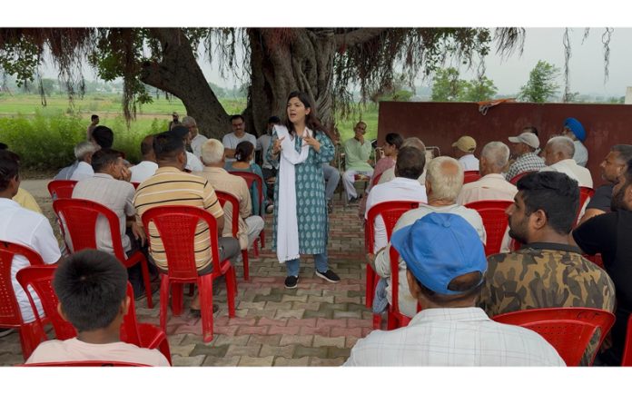 BJYM J&K vice-president, Devyani Rana addressing a public meeting at Malpur area of Nagrota Assembly Constituency.