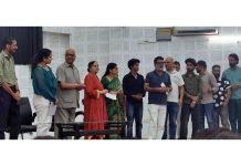 Theatre directors and artists along with organizers during award ceremony of 3-day Dogri Theatre Competition in Jammu.