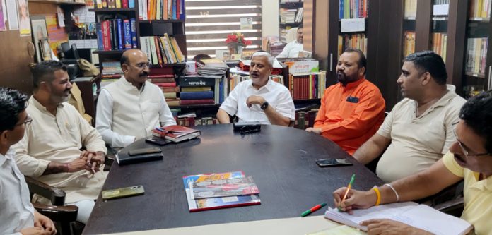 MLAs Sham Lal Sharma and Mohan Lal Bhagat during a public darbar in Jammu. MLAs Sham Lal Sharma and Mohan Lal Bhagat during a public darbar in Jammu.