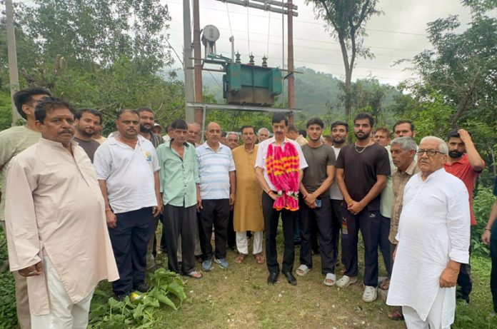 MLA Pawan Gupta and locals during inauguration of 250 KVA transformer at Krimchi. MLA Pawan Gupta and locals during inauguration of 250 KVA transformer at Krimchi.