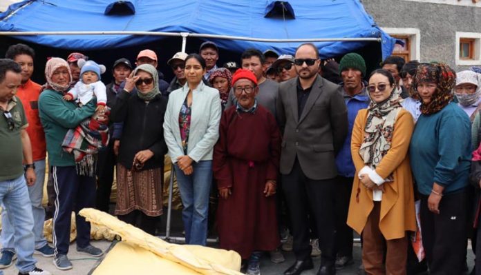 Govt officers with beneficiaries during distribution of essential incentives to sheep breeders and herders in Durbuk Block.