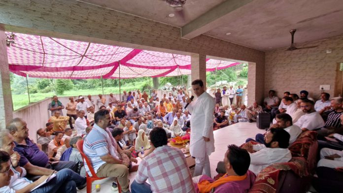 MLA Jasrota, Rajiv Jasrotia addressing a gathering during public grievances redressal camp at Juthana on Friday.