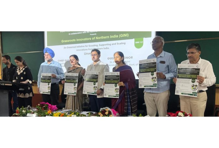 Minister Satish Sharma and other dignitaries launching GINI at a function in Jammu on Monday.