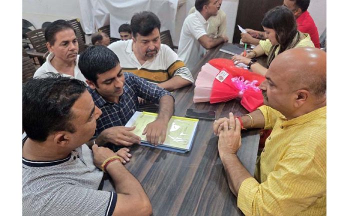 MLA Jammu East, Yudhvir Sethi listening public grievances at Jammu on Thursday.