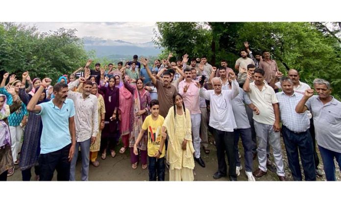 Thanot villagers protesting for construction of road.