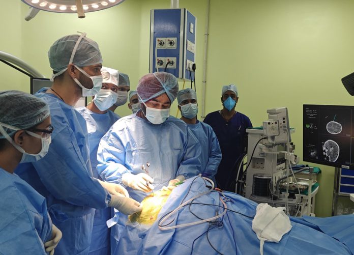 Doctors performing brain tumor surgery at SMVDNSH Katra. Doctors performing brain tumor surgery at SMVDNSH Katra.