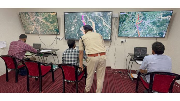 Police officials monitoring the yatra movement through hi-tech Geo-Fencing Surveillance and Facial Recognition Systems in Kulgam. Police officials monitoring the yatra movement through hi-tech Geo-Fencing Surveillance and Facial Recognition Systems in Kulgam.