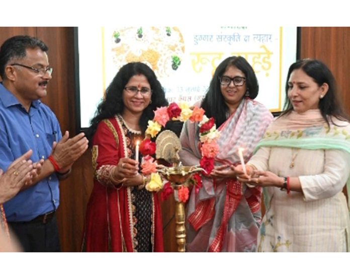 Guests lighting ceremonial lamp during inaugural of ‘Rutt Raade’ celebrations event at Udhampur Campus of JU on Monday. Guests lighting ceremonial lamp during inaugural of ‘Rutt Raade’ celebrations event at Udhampur Campus of JU on Monday.