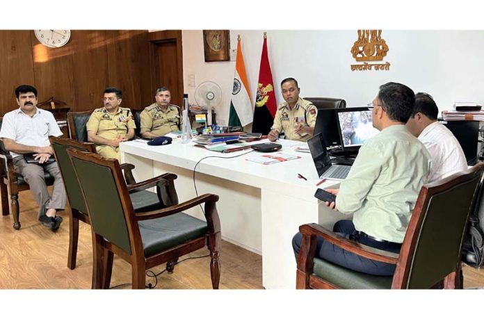 IGP Jammu, BS Tuti chairing a meeting of police officers in Jammu district on Wednesday.