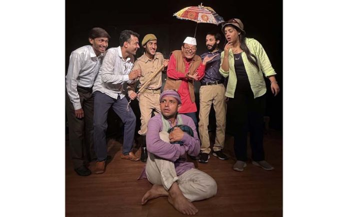 A scene from play 'Gatte-ch-Maanu' being staged in Jammu on Sunday.