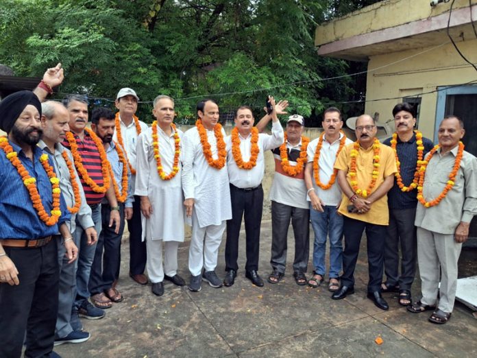 Office bearers of J&K PSCUF pose for a group photograph after a meeting in Jammu on Wednesday. Office bearers of J&K PSCUF pose for a group photograph after a meeting in Jammu on Wednesday.