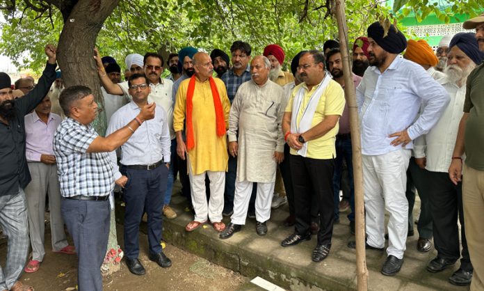 BJP MLAs, Vikram Randhawa and Dr Narinder Singh during their visit to Rani Bagh Shamshan Ghat on Thursday.