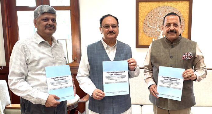Union Minister for Health & Family Welfare, J.P. Nadda and Union Minister for Science & Technology Dr Jitendra Singh being presented the Report 'Yoga and Prevention of Type 2 Diabetes' by Dr S.V. Madhu Prof & HoD Endocrinology University College of Medical Sciences and past President RSSDI, on Thursday.
