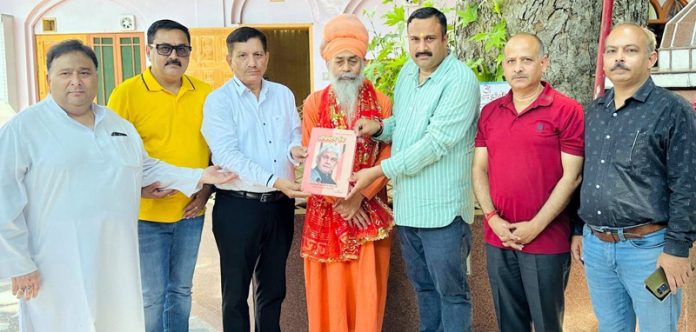 Members of SKJVS trust during meeting with Swami Amrit Das in Srinagar. Members of SKJVS trust during meeting with Swami Amrit Das in Srinagar.