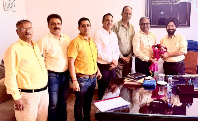 CTF office bearers posing with Rajinder Singh Tara, Controller, Legal Metrology J&K.