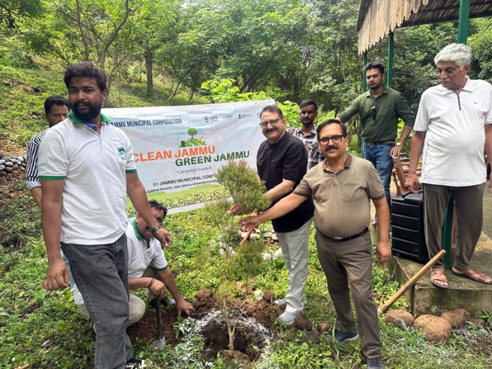 Dignitaries during a plantation drive at Roop Nagar on Tuesday.
