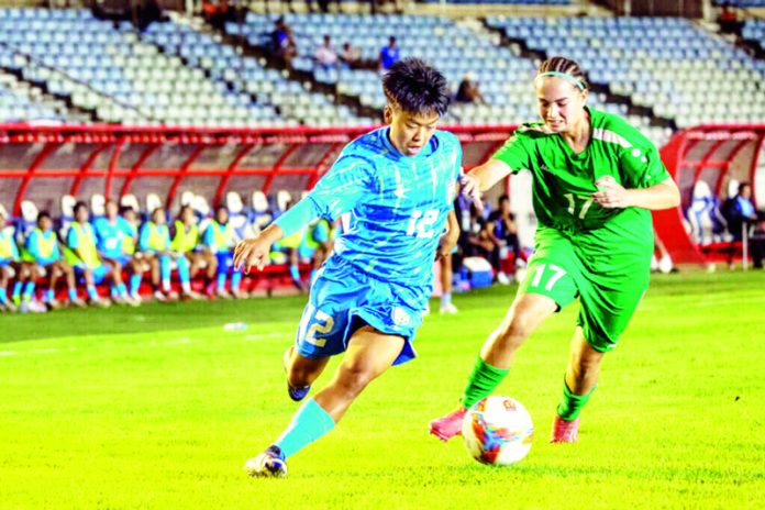 Players in action during match between India and Turkmenistan at Yangon on Friday.