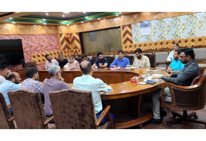 DDC Kupwara chairing a meeting.