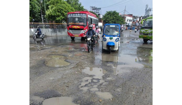 Worst condition of road at Dogra Chowk, Jammu. -Excelsior/Rakesh