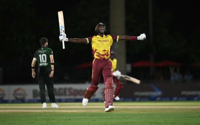 Jason Holder’s celebrating victory against Pakistan after smashing a boundary off last ball in a T20 match.