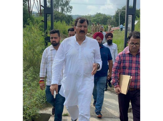 MLA Jammu West Arvind Gupta during visit to Sitlee Filtration Plant, accompanied by senior officials, to assess flood damage and review water supply disruptions.