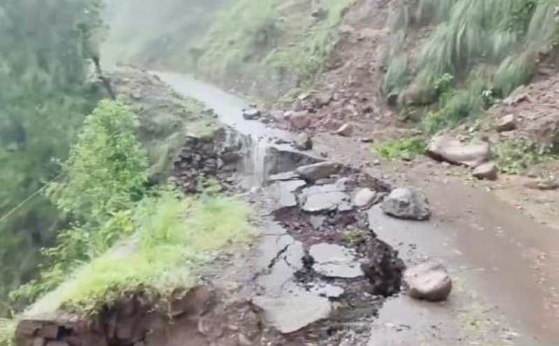 A link road damaged in heavy rain and landslide in Rajouri area on Tuesday. -Excelsior/Imran