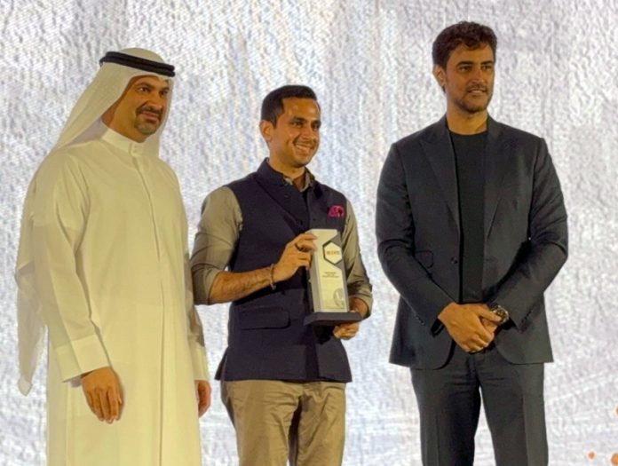 Arhan Bagati with a Award in Delhi.