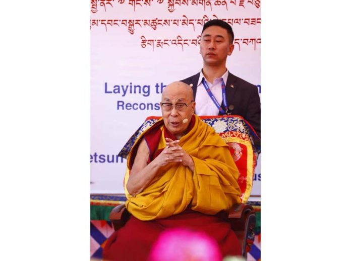 The 14th Dalai Lama blessing the community after laying foundation for new Chowkhang Vihara in Leh on Sunday.