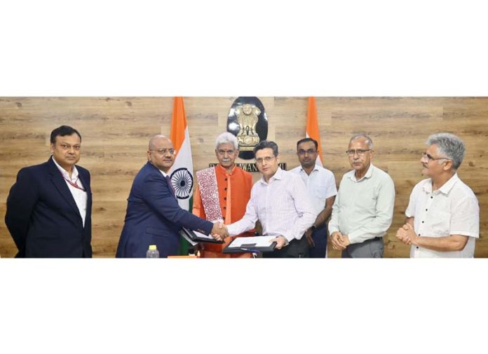 LG witnessing signing of MoU on Sunday.